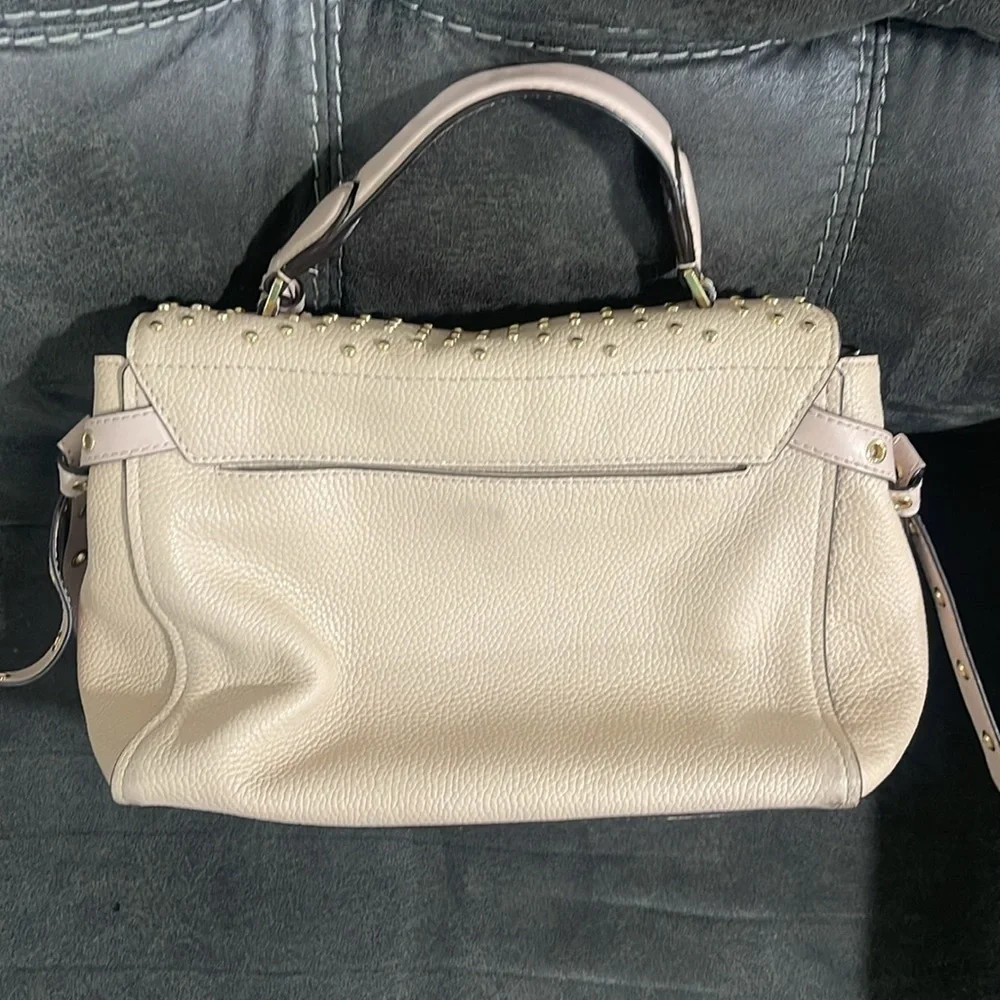 Michael Kors questions leave
